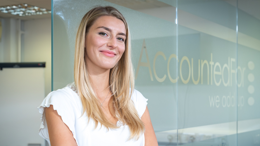 Female accountancy learner pictured in her place of work