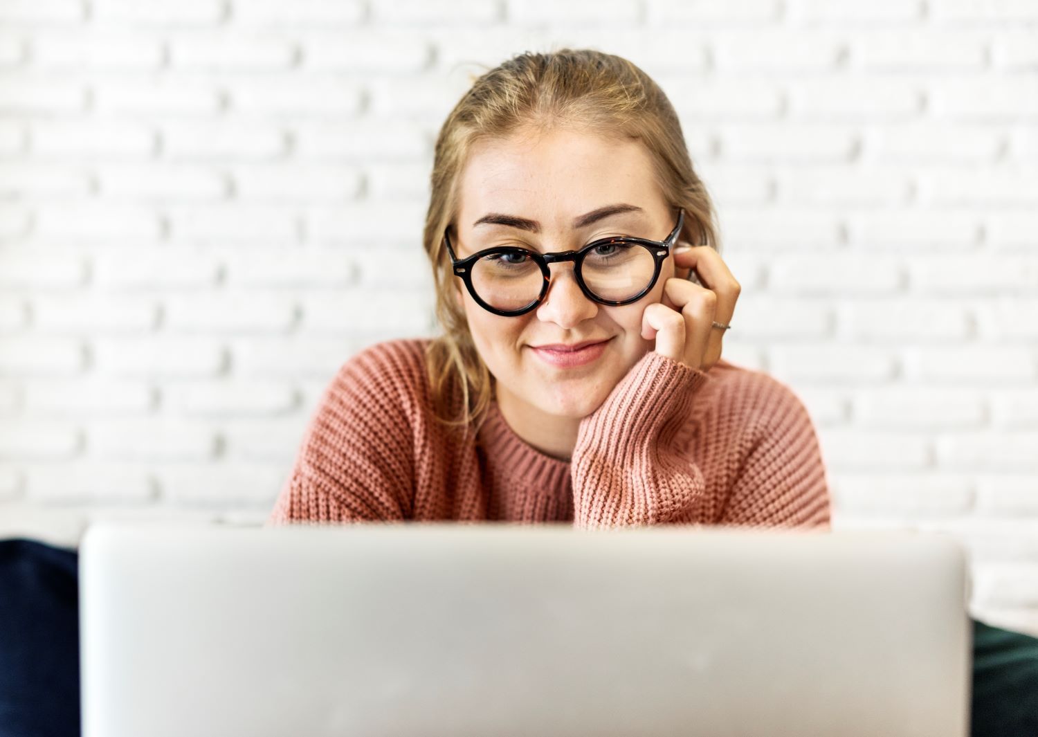 Confident young learner completing a stress management online training course.
